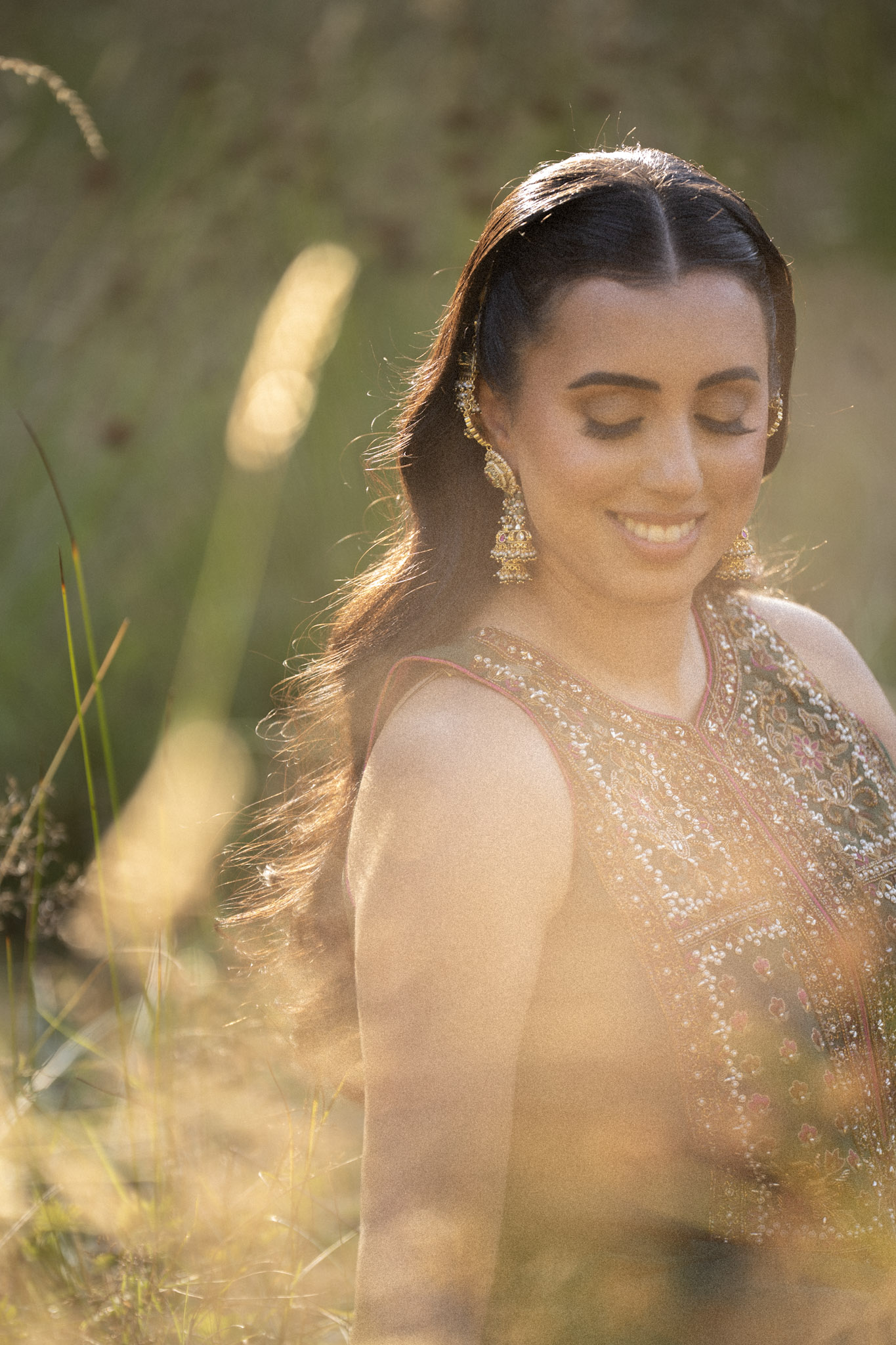 Portrait among sunlit grasses